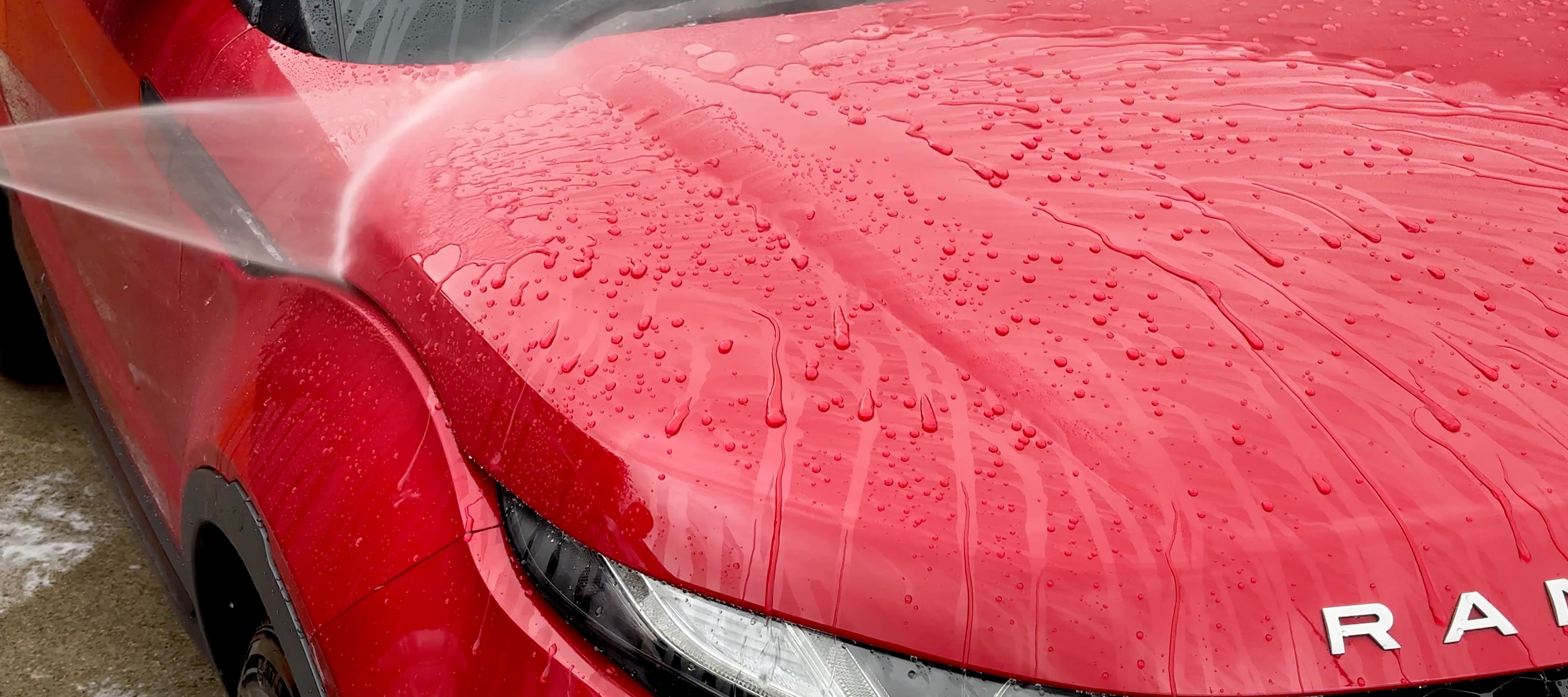 Hydrophobic effect on red car